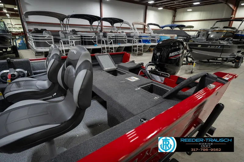 Slide: The Image of 2026 Lund 1650 Rebel XL SS boat with Mercury engine in showroom. - 28