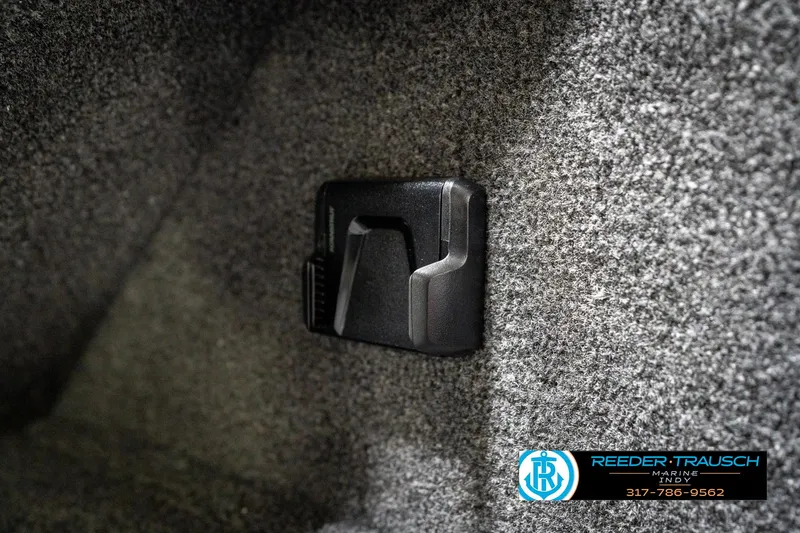 Slide: The Image of Interior detail of 2026 Lund 1650 Rebel XL SS boat with carpeted surface and clip. - 37