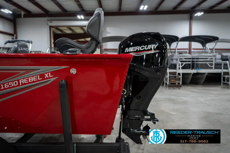 Slide: The Image of 2026 Lund 1650 Rebel XL SS boat with Mercury engine in showroom. - 44