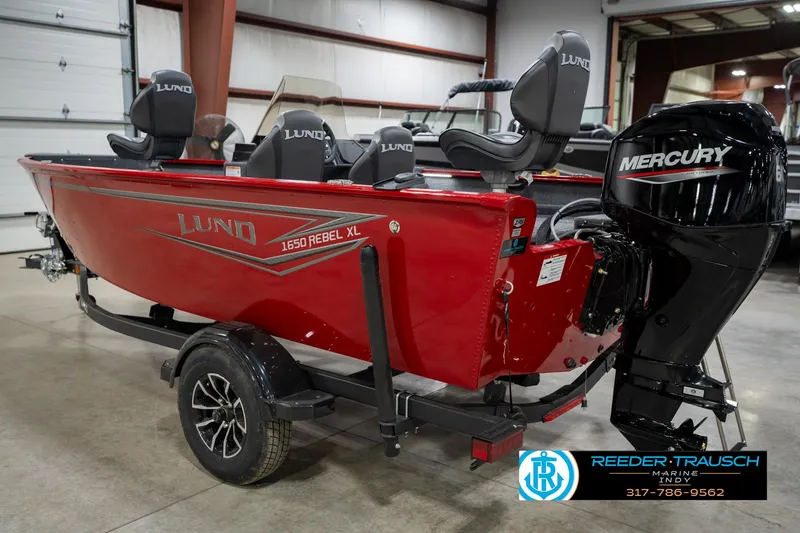 Slide: The Image of 2026 Lund 1650 Rebel XL SS boat with Mercury engine in showroom. - 8