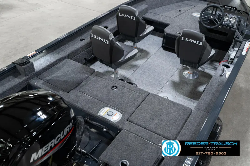 Slide: The Image of 2026 Lund 1775 Adventure SS boat interior with Mercury engine and seating arrangement. - 12