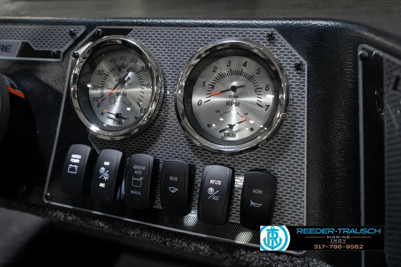 Slide: The Image of Dashboard of 2026 Lund 1775 Adventure SS boat with gauges and control switches. - 33