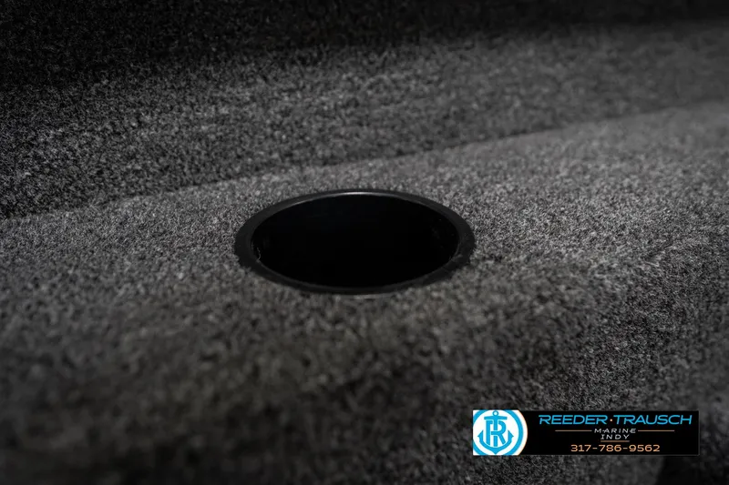 Slide: The Image of 2026 Lund 1775 Adventure SS boat interior with carpeted surface and cup holder. - 41