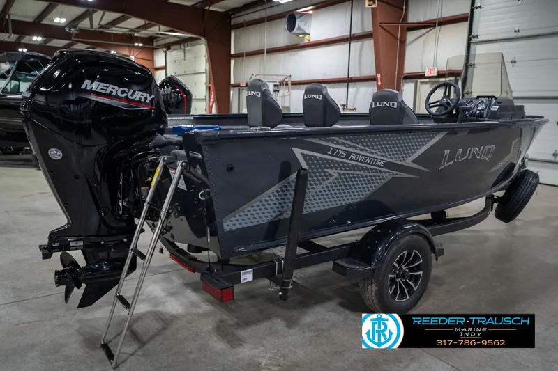 Slide: The Image of 2026 Lund 1775 Adventure SS boat with Mercury engine in showroom. - 6