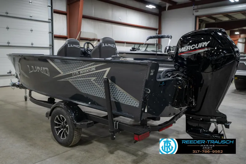 Slide: The Image of 2026 Lund 1775 Adventure SS boat with Mercury engine in showroom. - 8