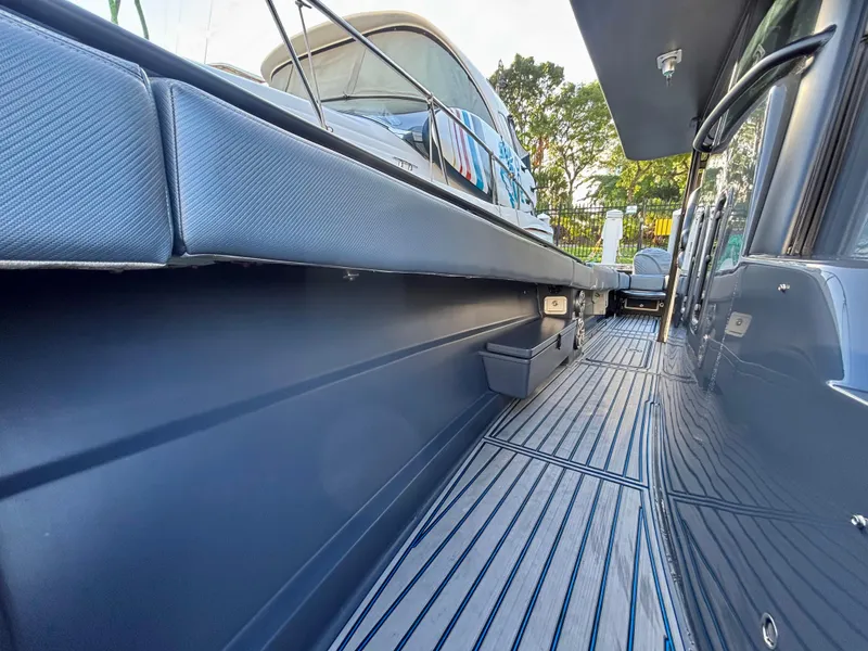 Slide: The Image of 2016 Hydra-Sports 4200 Siesta boat deck with sleek design and modern features. - 18