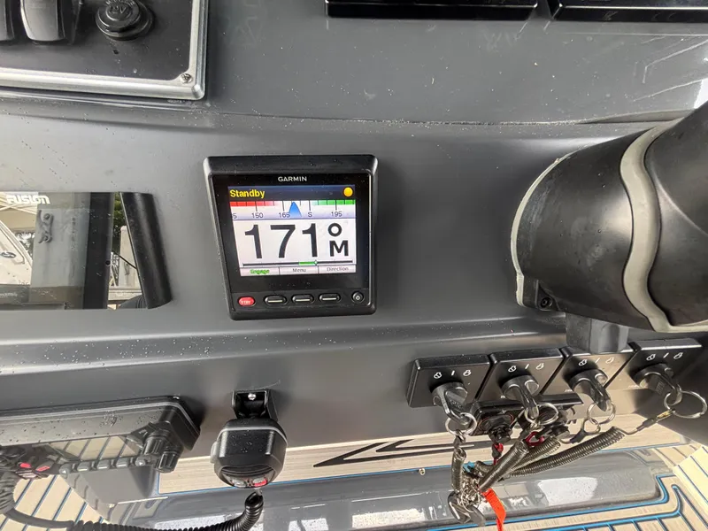 Slide: The Image of 2016 Hydra-Sports 4200 Siesta dashboard with Garmin display showing 171M in standby mode. - 28