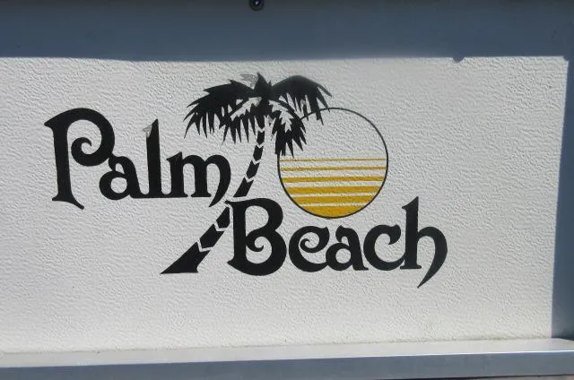 Slide: The Image of Palm Beach Super 220 logo with palm tree and sun, 1991 model. - 13