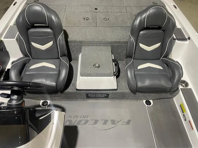 Slide: The Image of 2023 Falcon Boats F205 interior with two gray seats and center console. - 10