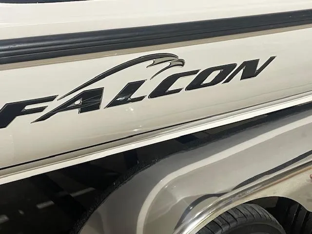 Slide: The Image of 2023 Falcon Boats F205 logo on boat exterior, showcasing sleek design. - 12