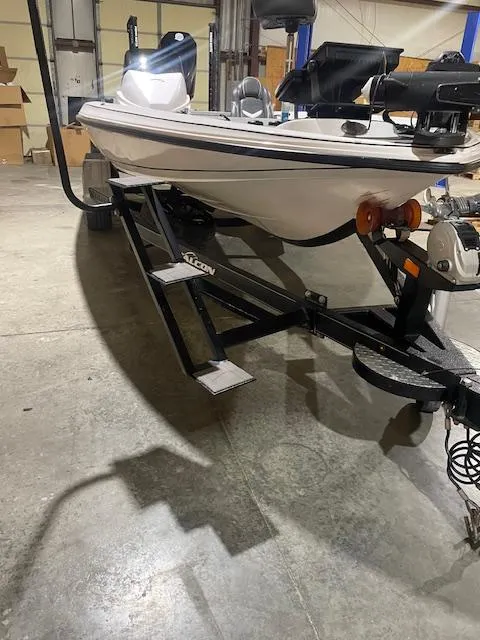 Slide: The Image of 2023 Falcon Boats F205 on trailer in a warehouse setting. - 5