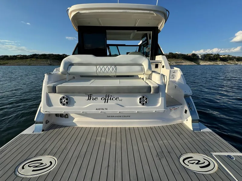 Slide: The Image of 2021 Regal 36 Grande Coupe yacht on water, rear view, Austin, TX. - 15