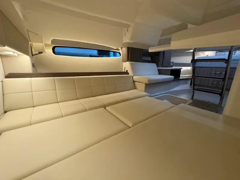 Slide: The Image of Luxurious interior of 2021 Regal 36 Grande Coupe yacht with modern seating and elegant design. - 44
