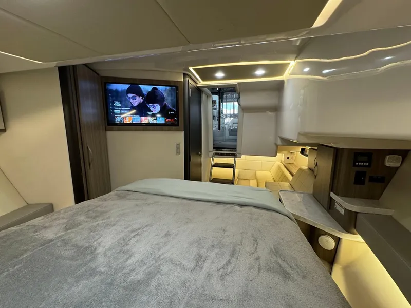 Slide: The Image of Luxurious interior of 2021 Regal 36 Grande Coupe with cozy bed and entertainment system. - 48