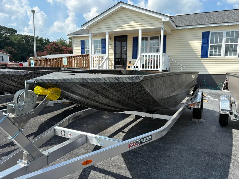 The Image of 2025 Edge Duck Boats Standard 656DB on trailer, parked outdoors under cloudy sky. - 0