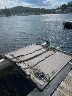 Slide: The Image of Hobie 16 catamaran on dock, 2017 model, with scenic lake background. - 6