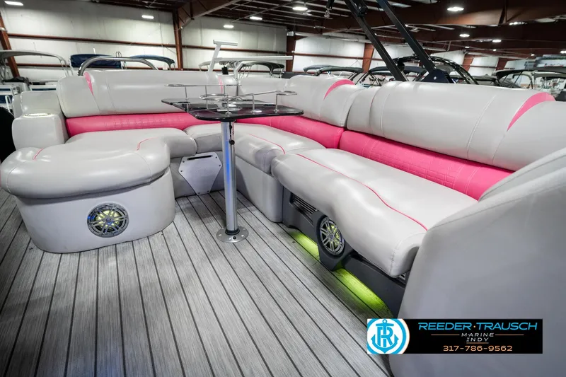 Slide: The Image of Luxurious interior of 2019 Avalon Ambassador 27' pontoon boat with plush seating and modern design. - 32