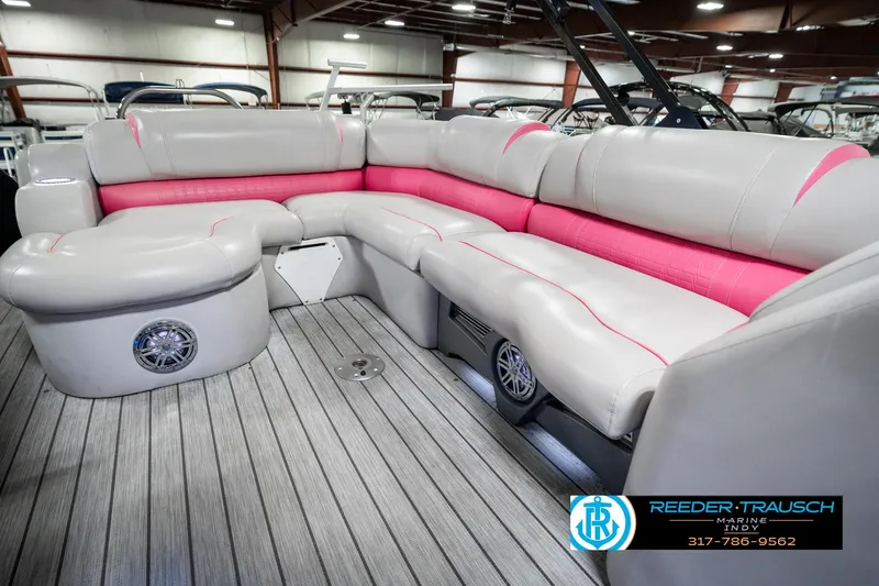 Slide: The Image of Luxurious seating on 2019 Avalon Ambassador 27' pontoon boat with pink accents. - 33