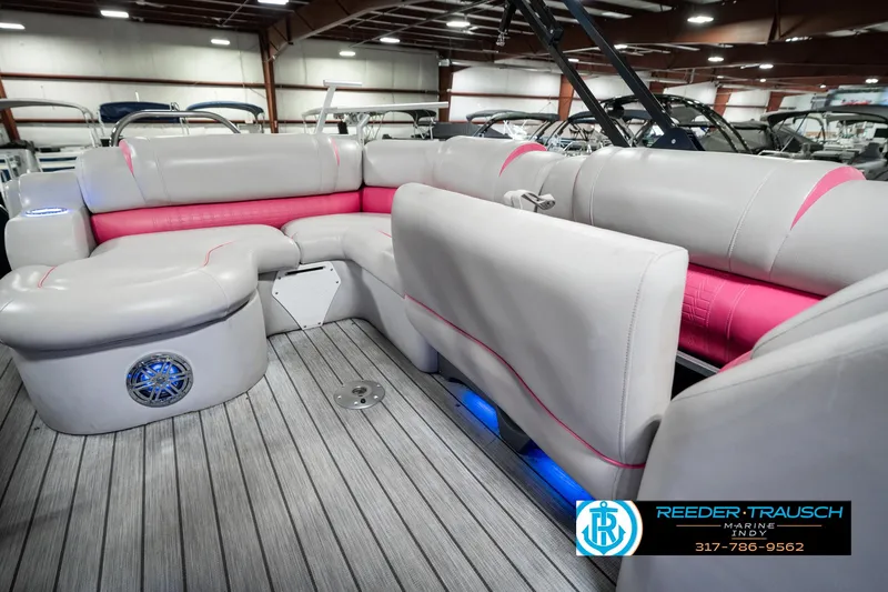Slide: The Image of Luxurious 2019 Avalon Ambassador 27' boat interior with pink and gray seating. - 34
