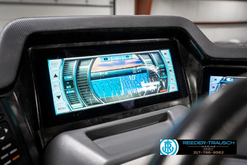 Slide: The Image of Dashboard display of 2019 Avalon Ambassador 27' boat with digital controls and navigation. - 43