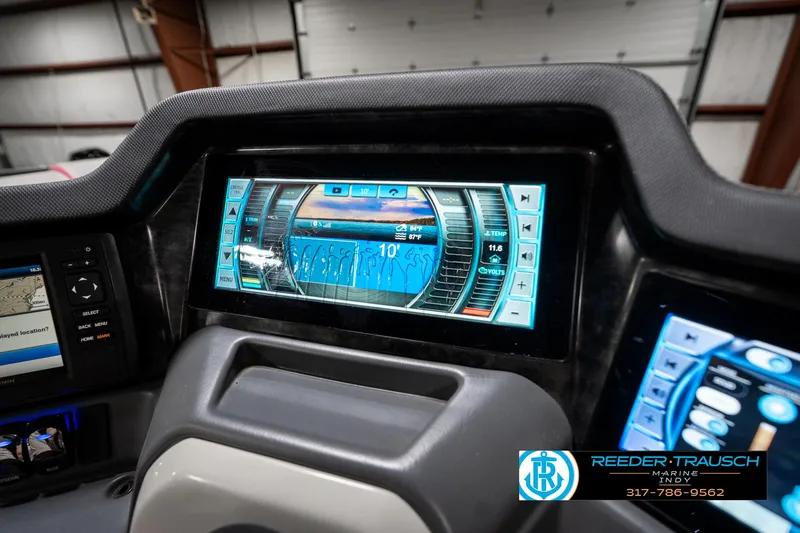 Slide: The Image of Dashboard of 2019 Avalon Ambassador 27' boat with digital display and controls. - 45