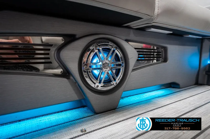 Slide: The Image of 2019 Avalon Ambassador boat interior with illuminated speaker and blue LED lighting. - 49