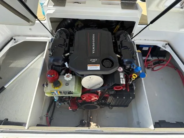Slide: The Image of 2020 Cobalt CS23 boat engine compartment with Volvo Penta V6 engine. - 19