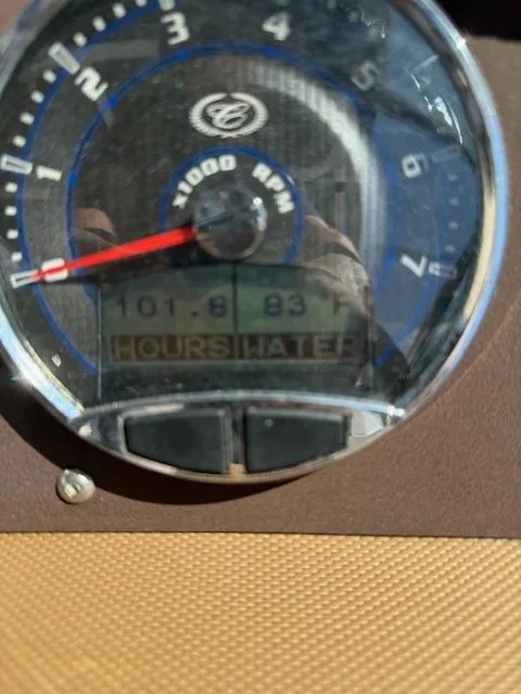 Slide: The Image of Close-up of a 2020 Cobalt CS23 tachometer displaying 101.8 hours and 83°F temperature. - 21