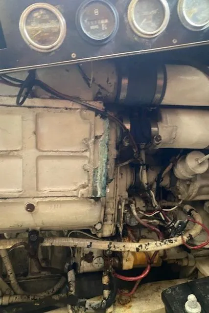 Slide: The Image of Engine compartment of a 1984 Post 43 Sport Fisherman boat, showing gauges and wiring. - 17