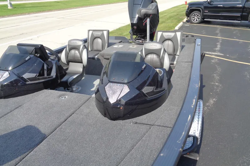 Slide: The Image of 2025 Lund 1875 Pro-V Bass XS boat with sleek design and comfortable seating. - 19