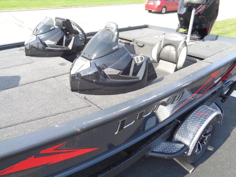 Slide: The Image of 2025 Lund 1875 Pro-V Bass XS boat with sleek design and modern features. - 3