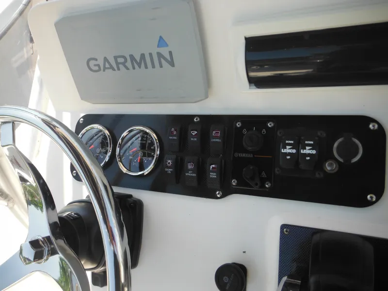 Slide: The Image of Dashboard of 2004 Sea Hunt 202 TRITON boat with Garmin navigation system. - 42