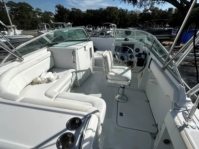 Slide: The Image of Interior of 2006 Glacier Bay 2600 boat with seating and steering console. - 7