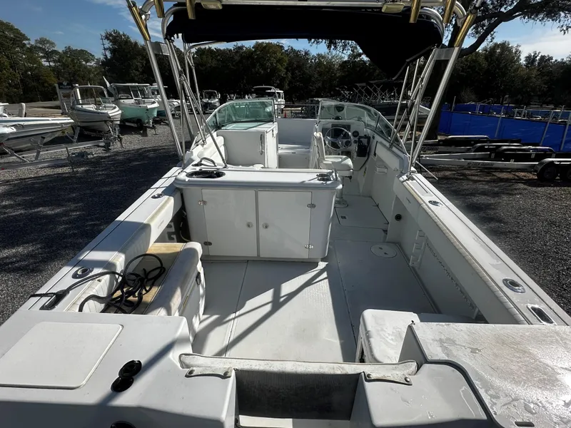 Slide: The Image of 2006 Glacier Bay 2600 boat cockpit with steering wheel and control panel. - 9