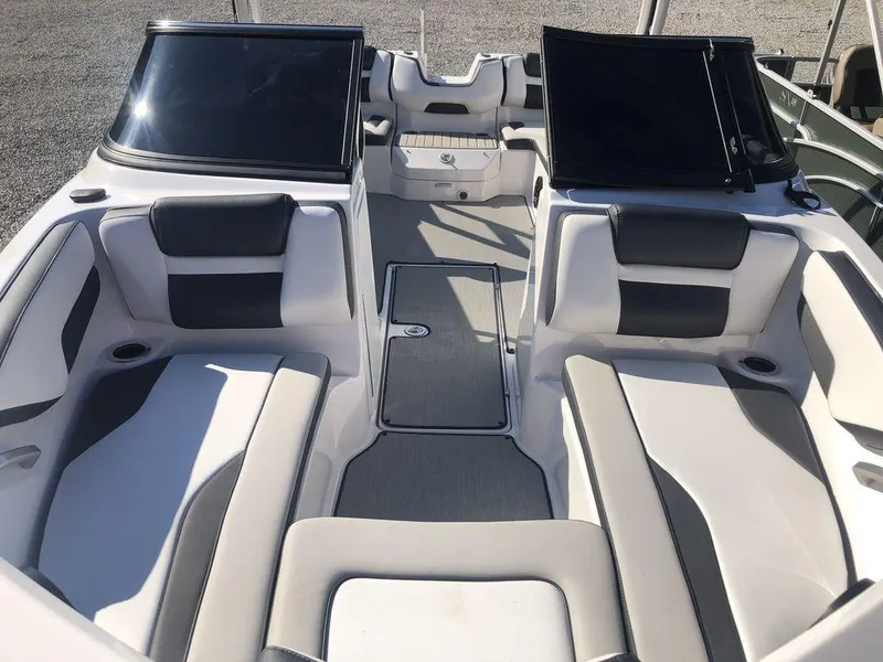 Slide: The Image of 2023 Yamaha Boats AR195 interior with sleek seating and modern design. - 3