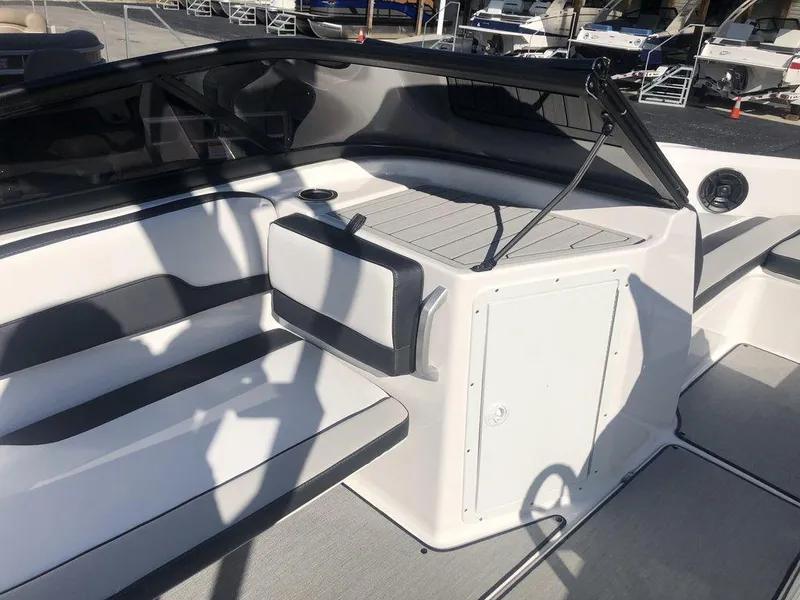 Slide: The Image of 2023 Yamaha AR195 boat interior with sleek seating and modern design. - 7