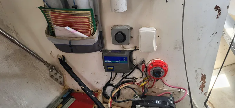 Slide: The Image of Electrical panel and wiring inside a 1983 Beneteau First Class 10 sailboat. - 7
