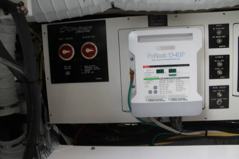 Slide: The Image of Electrical panel of 2014 Cruisers Yachts 350 Express with ProNautic 12-40P charger. - 26