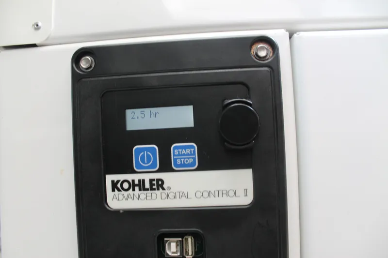 Slide: The Image of Kohler Advanced Digital Control panel on 2014 Cruisers Yachts 350 Express, displaying 2.5 hours. - 29