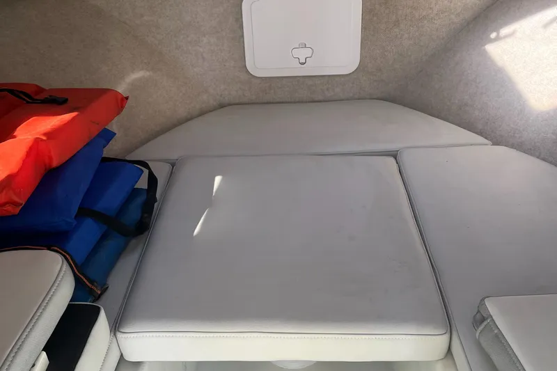 Slide: The Image of Interior cabin of 2020 Parker 2530 Extended Sport Cabin with cushions and life jackets. - 6