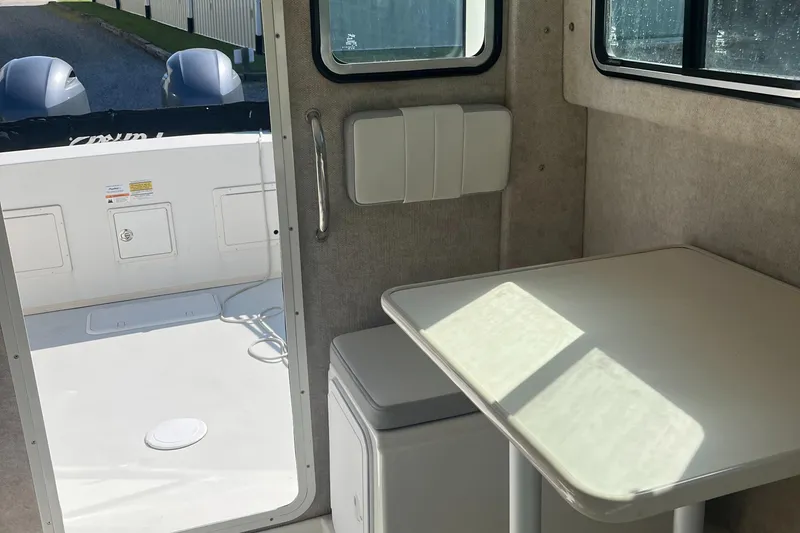 Slide: The Image of Interior of 2020 Parker 2530 Extended Sport Cabin with table and seating. - 7