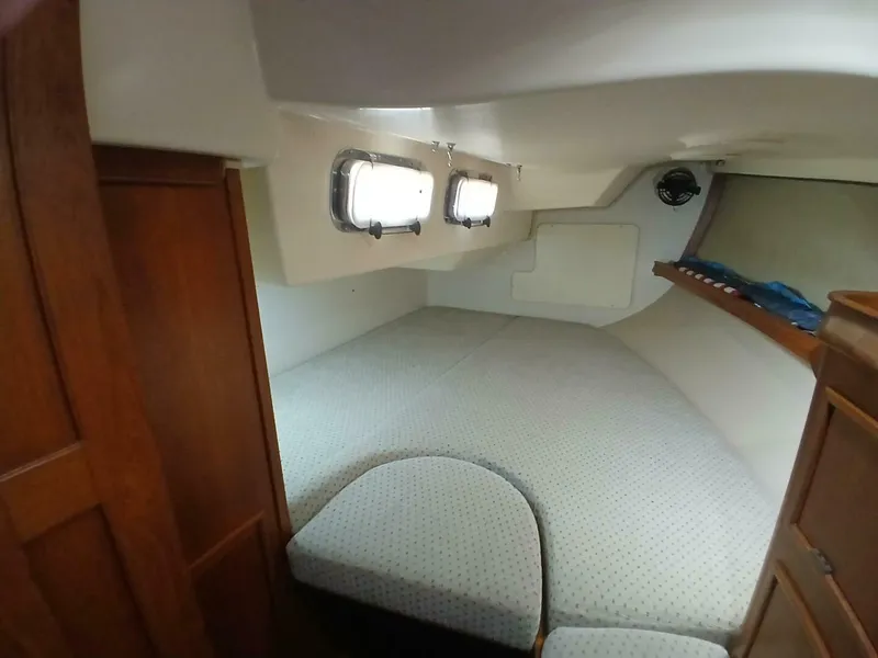 Slide: The Image of Interior cabin of 1999 Island Packet 45 sailboat with cozy sleeping area. - 28
