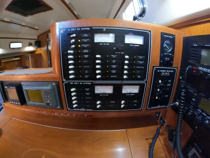 Slide: The Image of Electrical control panel on a 1999 Island Packet 45 yacht interior. - 34