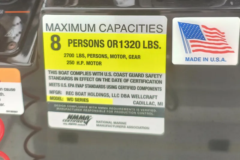 Slide: The Image of 2020 Wellcraft 222 Fisherman capacity label, 8 persons or 1320 lbs, made in USA. - 27