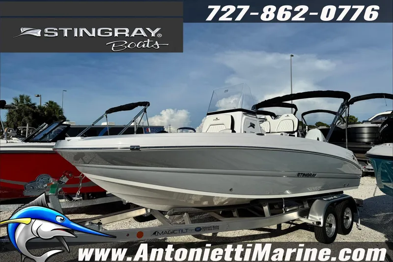 The Image of 2026 Stingray 206 CC boat on trailer at Antonietti Marine dealership. - 0