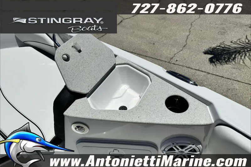 Slide: The Image of Stingray 206 CC boat interior detail with storage compartment, 2026 model. - 22