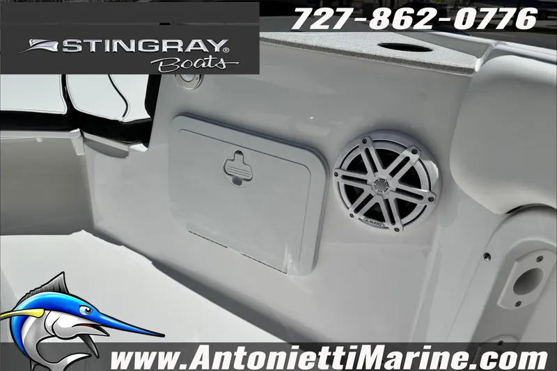 Slide: The Image of Stingray 206 CC boat interior with speaker and storage compartment, Antonietti Marine branding. - 23