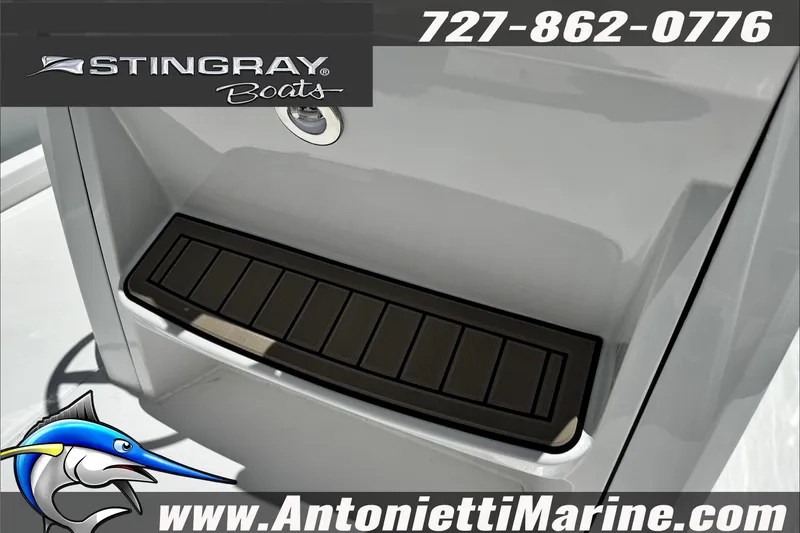 Slide: The Image of 2026 Stingray 206 CC boat detail with logo and contact information. - 25