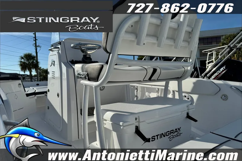 Slide: The Image of 2026 Stingray 206 CC boat interior with seating and storage, featuring Antonietti Marine branding. - 36