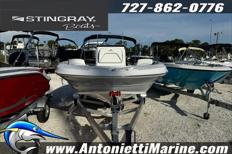 Slide: The Image of 2026 Stingray 206 CC boat on display at Antonietti Marine dealership. - 41